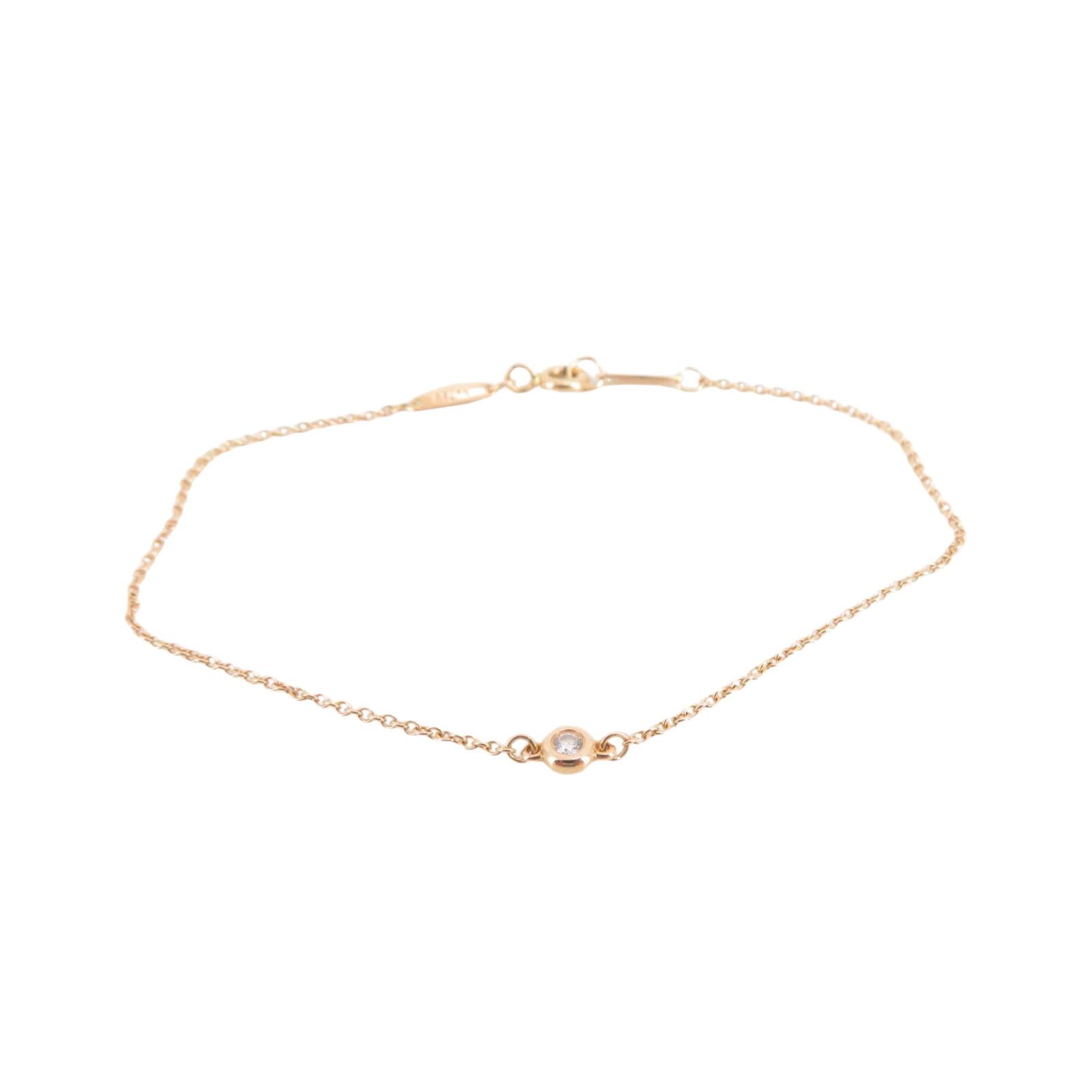 Tiffany & Co. Elsa Peretti Diamonds by the Yard Single Diamond 18K Rose Gold Bracelet: Description: Tiffany & Co. Elsa Peretti Diamonds by the Yard bracelet crafted in 18K rose gold and accented with a natural diamond. Designed by Elsa Peretti, the iconic Diamonds by the Yard collec