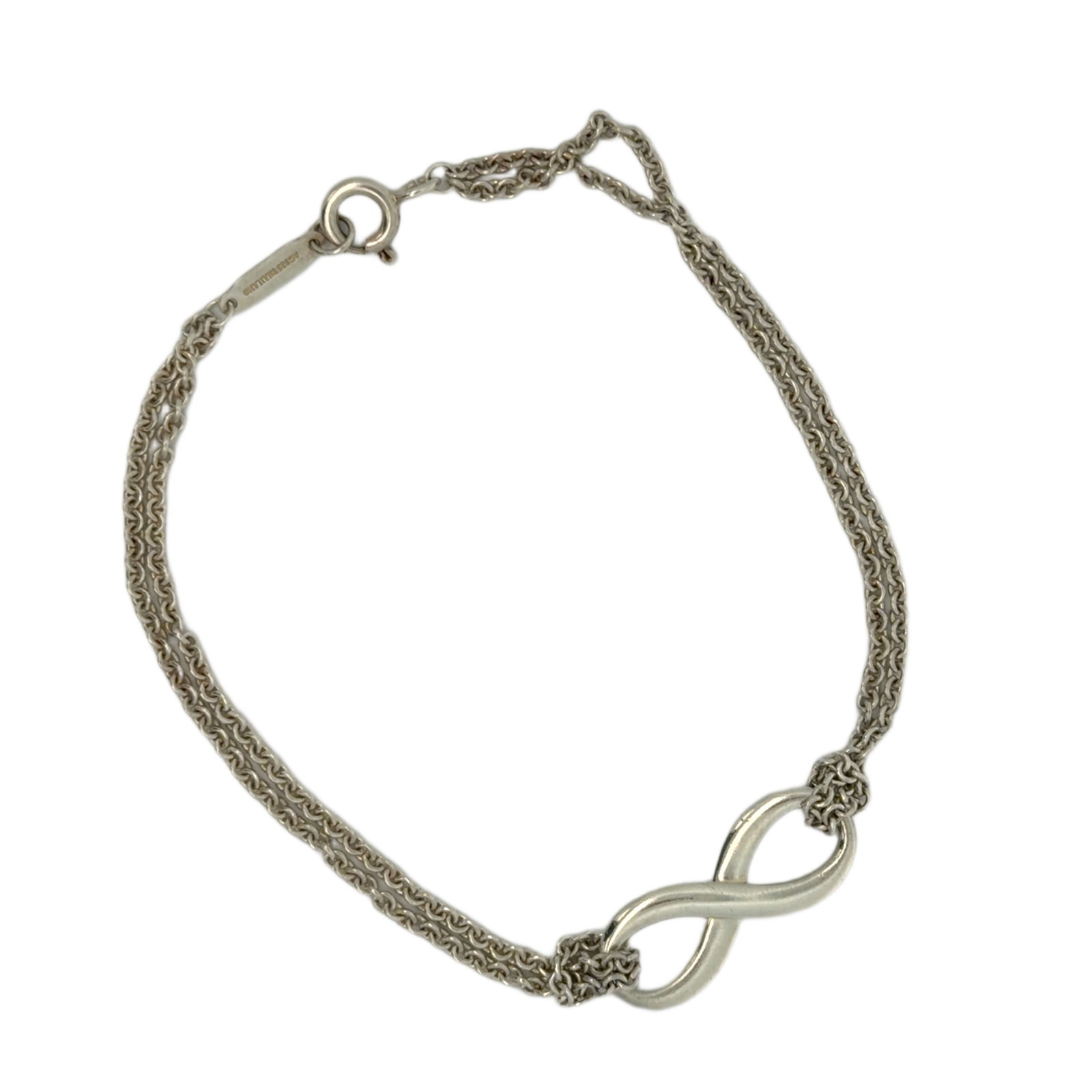 Tiffany & Co. Infinity 8 Motif Sterling Silver Chain Bracelet, 17.8cm: Title/Medium Tiffany & Co. Infinity 8 Motif chain bracelet in 925 sterling silver. Origin/Year Maker: Tiffany & Co. Year and country of manufacture are not stated. Dimensions Approximately 17.8cm long