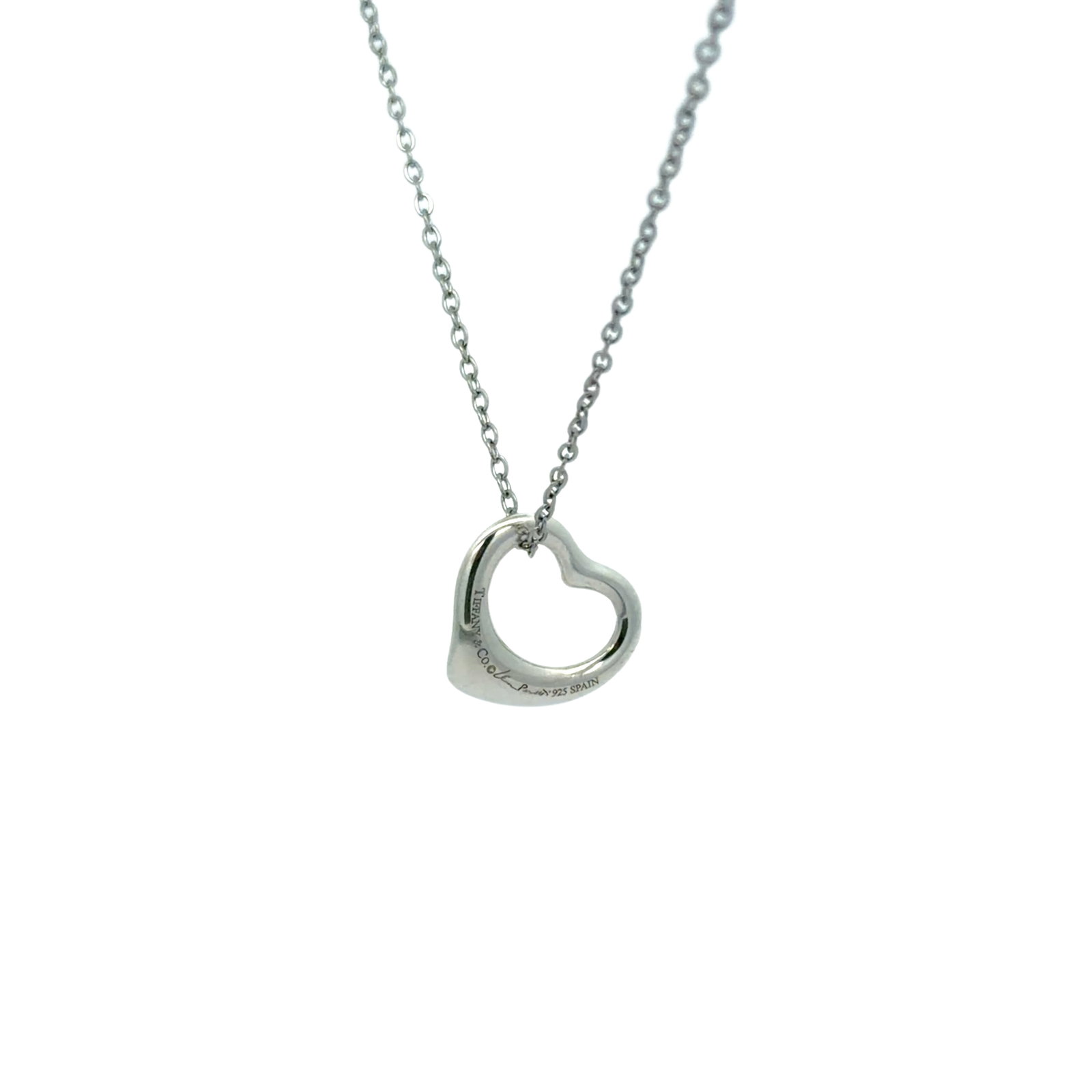 Tiffany & Co. 925 Sterling Silver Heart Motif Necklace: Title/Medium: Tiffany & Co. Heart Motif Necklace in polished 925 sterling silver. Origin/Year: Tiffany & Co.; year of manufacture not specified. Dimensions: Chain length and pendant measurements not s