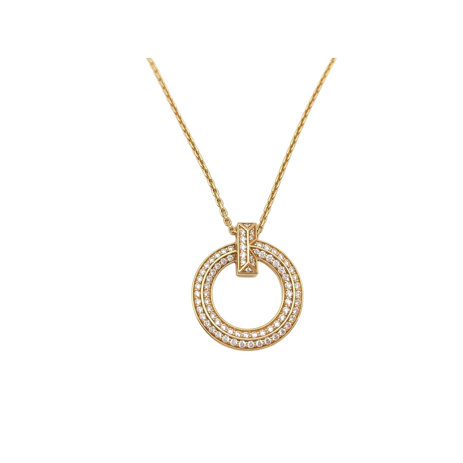 Tiffany & Co. One Circle Pave Diamond 18K Yellow Gold Pendant Necklace: Description: Tiffany & Co. One Circle necklace crafted in 18K yellow gold and accented with pave set natural diamonds. Featuring a polished circular motif highlighted by the brilliance of diamonds