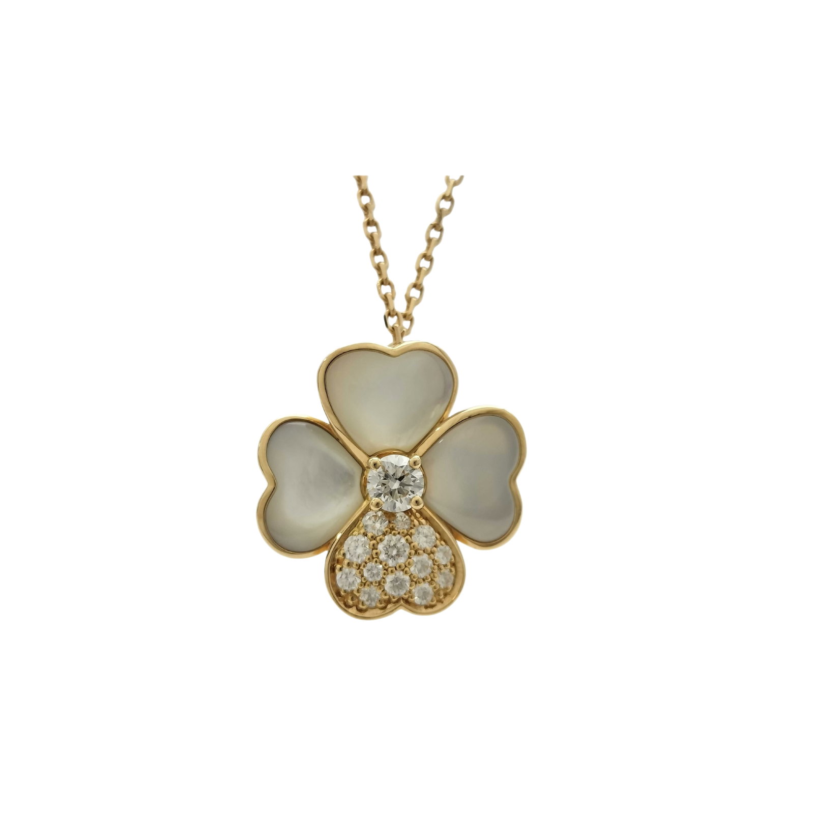 Van Cleef & Arpels Cosmos Flower White Mother of Pearl Pave Diamond 18K Yellow Gold Clip Pendant: Description: Van Cleef & Arpels Cosmos Flower clip pendant crafted in 18K yellow gold and accented with natural white mother of pearl and brilliant pave set diamonds. From the elegant Cosmos colle