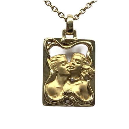 Carrera y Carrera 18K Yellow Gold Double Figure Relief Diamond Pendant Necklace: Title/Medium: Carrera y Carrera Double Figure Relief Diamond Pendant Necklace, 18K Yellow Gold Origin/Year: Carrera y Carrera, Spanish luxury jewelry house; year unknown Dimensions: Chain measures app