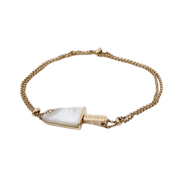 Bulgari Gelati White Mother of Pearl 18K Rose Gold Ice Cream Bracelet: Description: A playful yet luxurious Bulgari Gelati bracelet, finely crafted in solid 18K rose gold (750PG) and featuring a charming ice cream motif inlaid with luminous white Mother of Pearl. This wh