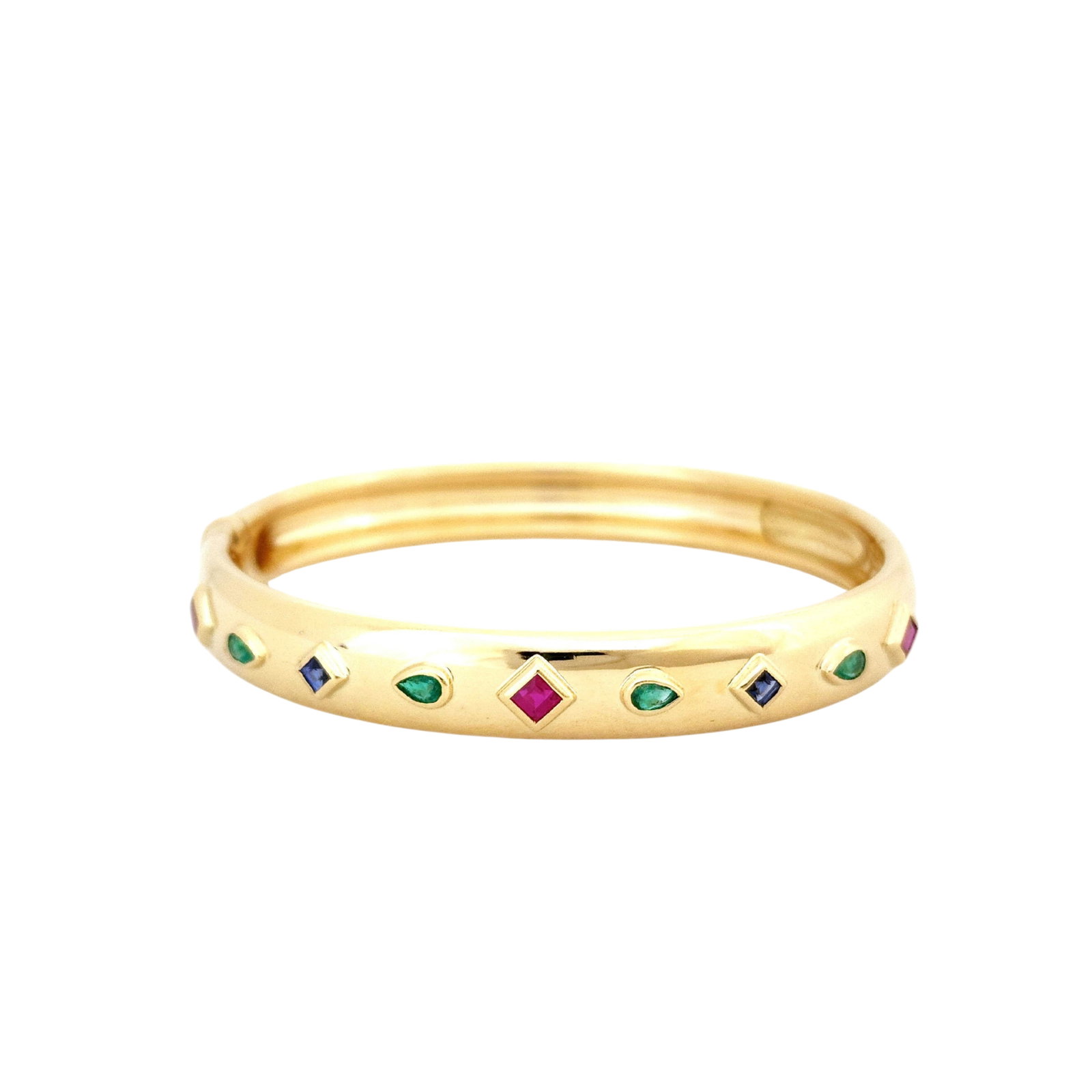 Cartier Byzantine Ruby Sapphire Emerald Diamond 18K Yellow Gold Bangle Bracelet: Description: Cartier Byzantine bangle bracelet crafted in 18K yellow gold and accented with natural diamonds, rubies, sapphires, and emeralds. Inspired by the rich artistry of Byzantine design, this e