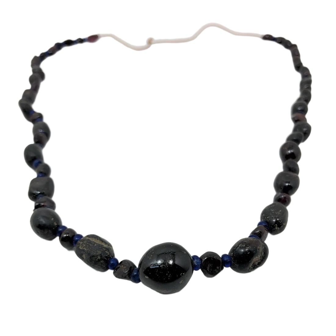 Garnet & Glass Necklace, Sassanian/Islamic Era: Title/Medium: Middle Eastern Sassanian/Islamic Garnet and Glass Necklace Origin/Year: Sassanian/Islamic Era, 6th-12th Century Dimensions: Not specified Condition: Excellent Provenance: Historical coll