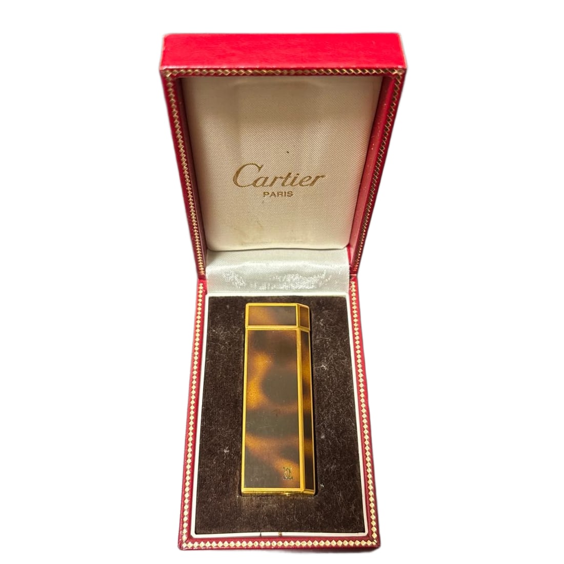 Vintage Cartier Paris Gold Tone Tortoiseshell Style Lighter with Box: Title/Medium: Vintage Cartier Paris rectangular lighter in gold-tone metal with mottled brown tortoiseshell-style panels. Origin/Year: Cartier Paris; vintage period, exact year unknown. Dimensions: Di