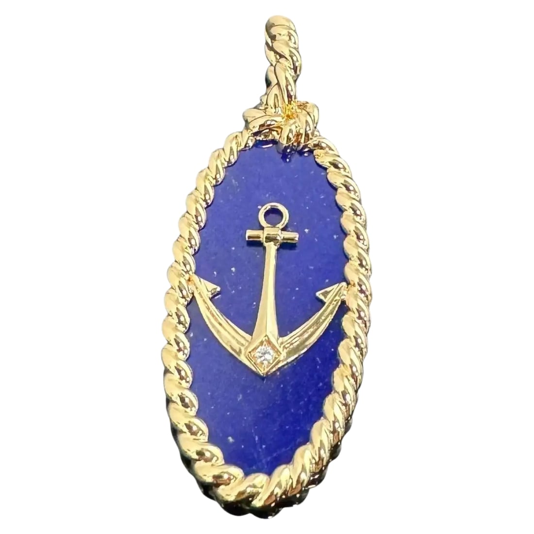 Vintage Van Cleef & Arpels 18K Gold Lapis Lazuli Diamond Anchor Pendant: Title/Medium: Vintage Van Cleef & Arpels nautical anchor pendant medallion in 18K yellow gold, lapis lazuli, and diamond. Origin/Year: Van Cleef & Arpels; vintage period. Specific country of origin an
