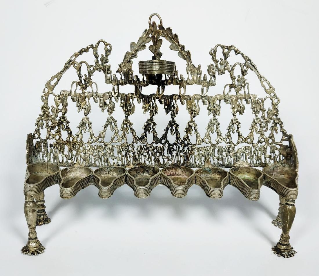 Silver Hanukkah menorah: A back menorah made out of silver, in a very good condition, second half of the 20th century. length-20 cm, height- 17 cm weight- 335 gram silver signatures and signed by the artist