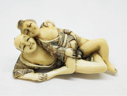 A Japanese erotic bone figure: colorful engravings , signed length-5.5 cm period- 20th century