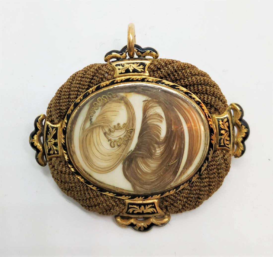 Momento Mori gold pin/pendant: Made of 14 k gold and hair. Gold is decorated with black enamel as was charachteristic of the time. dimensions :4*3cm weight: 7.9 grams