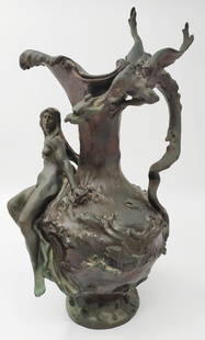 French bronze vase, Art Nouveau: A French vase made out of bronze casting in shades of black, signed Marcel debut. decorated with a woman figure and a mythological animal. In a general very good condition , hole on the bottom. height