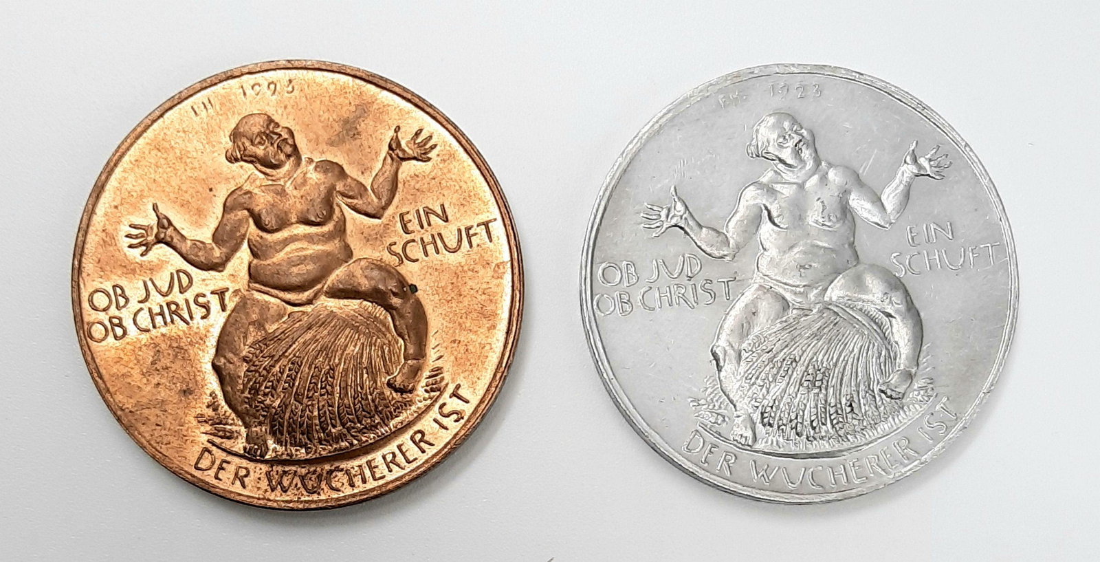 2 Anti-Semite Medals Bronze Aluminum 1923: Obverse: lettering: "OB JUD OB CHRIST EIN SCHUFT DER WUCHERER IST" (Translation: If Jew wether Christian a wretch a wretch who is a profitier) A nude fat man sitting on a corn shock;