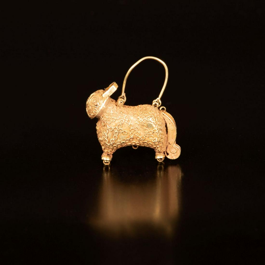An antique 14K Gold Persian Lion shaped earring (1 of 3)
