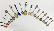 Novel collection of 17 enameled silver silver spoons 1900-1970