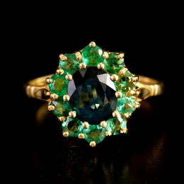 A 14K Yellow Gold, Sapphire and Emerald Halo Ring