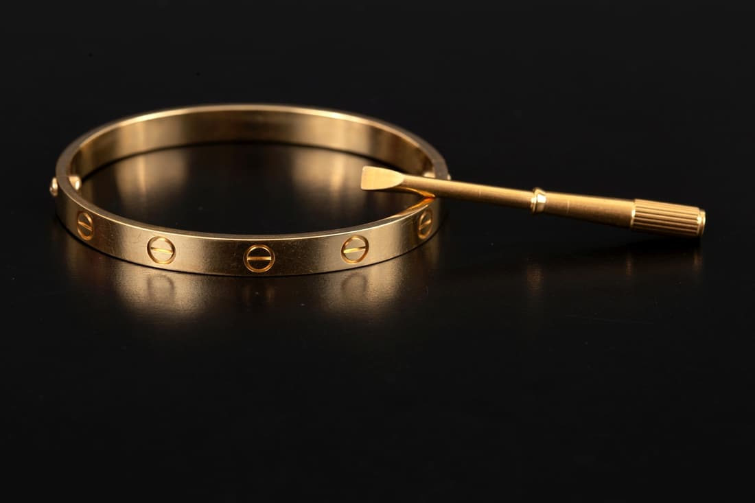 bangle bracelet made of 18K yellow gold, signed "Cartier*". (1 of 7)