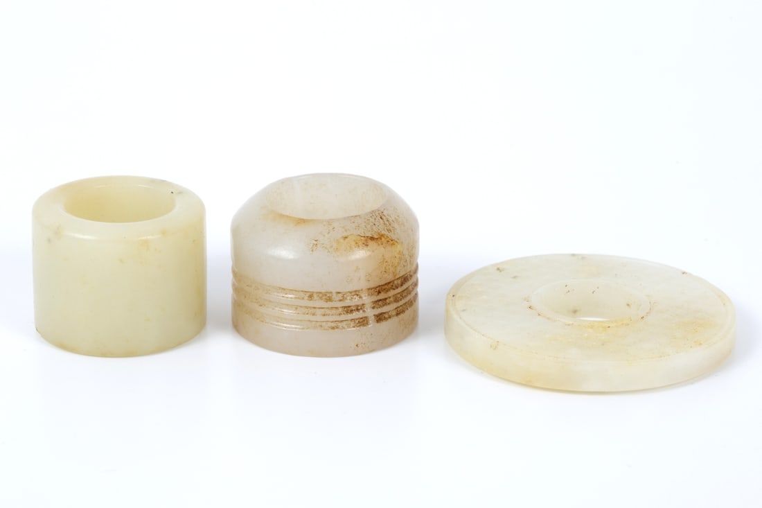 Two Archer Rings and A Bi Disk Carved Jade-China, Xing (1 of 3)