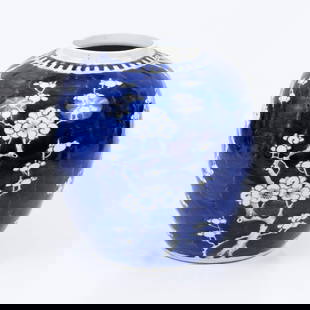 Chinese blue and white vase: portrays cherry blossoms Dimensions: 19-22 cm 