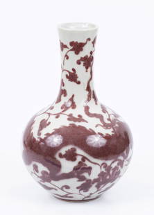 Dragon decorated vase, Qing Dynasty China: A long dragon figure on a floral background Dimensions: 17-24 cm 