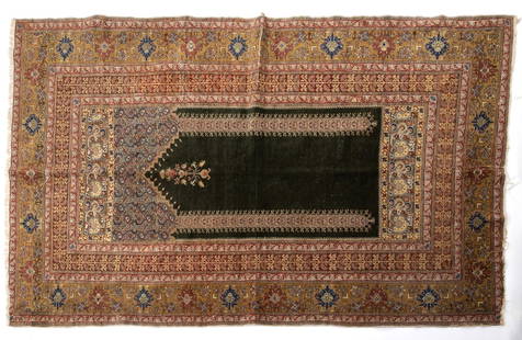 old Turkish prayer rug: The inner part shows the Mhirab (mhirab) prayer gate facing Mecca, on a dark green background. The frame of the carpet is filled with organic details on a dark red and gold background Dimensions: