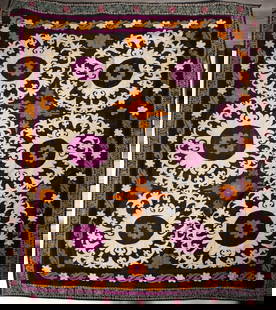 A large Suzani embroidery, late 19th to early 20th century: An impressive embroidery with organic motifs in dark purple, yellow, and white on a dark background. Dimensions: 200-200 cm Minor tears and stains.