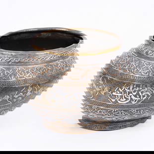 Islamic vase decorated with Damascus work - 19th century: An Islamic vase from the 19th century decorated with rich Damascus metal work - silver and copper inlay In brass (inlay) with a geometric pattern and an Islamic calligraphy pattern as well as