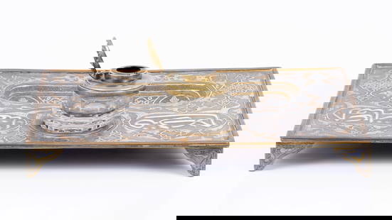 Islamic inkwell decorated with Damascus work - 19th century: A 19th century Islamic inkwell decorated with rich Damascus metal work- Silver and copper inlay in brass with an Islamic calligraphy pattern and a geometric pattern as well as in manual and