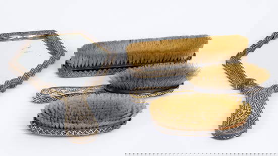 Toiletry set for women Damascus metal work - 19th century: A toiletry set for women that includes a hand mirror and three hair brushes decorated with damascus metal work- Silver and copper inlay in brass (inlay) with a geometric pattern and an Islamic