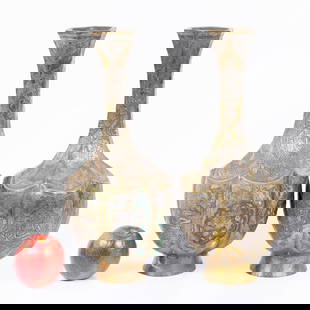 two Syrian Islamic vases inlaid with silver early 20th c: Made of brass, adorned with silver and copper veins creating a tricolor effect, featuring an organic pattern with combined Arabesque motifs and Arabic calligraphy. Dimensions: 38-17 cm.