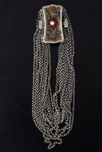 A magnificent Austro-Hungarian silver pendant featuring an ornate clasp adorned with filigree and: An Austro-Hungarian necklace from the second half of the 19th century, made of silver (signed and bearing the artist's initials 'KE'). It features an ornate clasp adorned with high-quality filigree