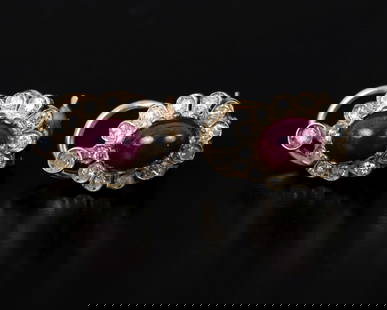 14K gold and silver earrings studded with rubies & diamonds: A pair of old earrings whose front is made of silver (acid tested) inlaid with cabochon-polished rubies An oval with a halo of 12 diamonds in a single cut polish and an additional diamond in the