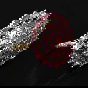 Georgian ring in 18K gold and silver set with pink topaz stones: An antique and unique Georgian ring from the late 18th century (around 1780-1790), possibly Portuguese, made of 18 karat yellow gold (acid tested) with a silver top. It is adorned with pinkish-peach