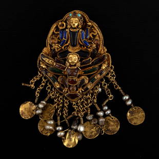 A 22K Gold and Gem Amulet Pendant, Nepal 18th CE: Amulet is depicting a multi-armed deity atop a second winged deity. The amulet is inlaid with many gemstones consisting of carved lapis lazuli, jade, carnelian, turquoise and quartz. Together with num