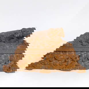 The Black Forest - A unique jewelry box with a lid of a dog: A unique jewelry box from the "Black Forest" workshop, crafted from hand-carved wood. On the box's lid stands a dog with eyes adorned with garnets or red glass. Lined with