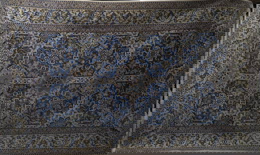 Large dimensional carpet: The center of the carpet features square medallions in shades of blue, with the border of the carpet in a cream tone with organic elements. Dimensions: 330-200.