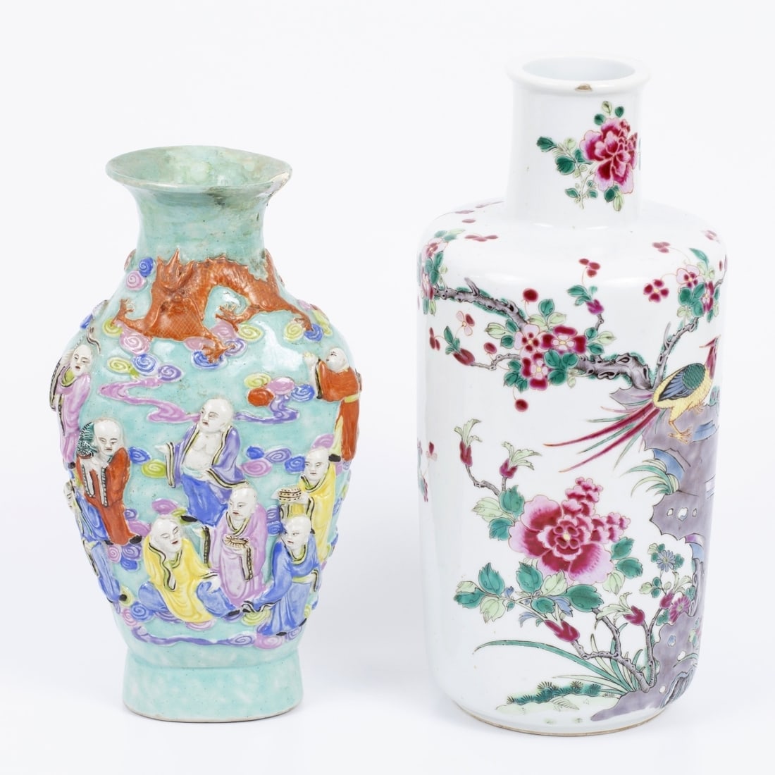 A pair of old Chinese porcelain vases decorated with enamel: A pair of Chinese vases from the first half of the 20th century, old enamel decorated with patterns Various. Chips and blemishes Height range: 23-27 cm