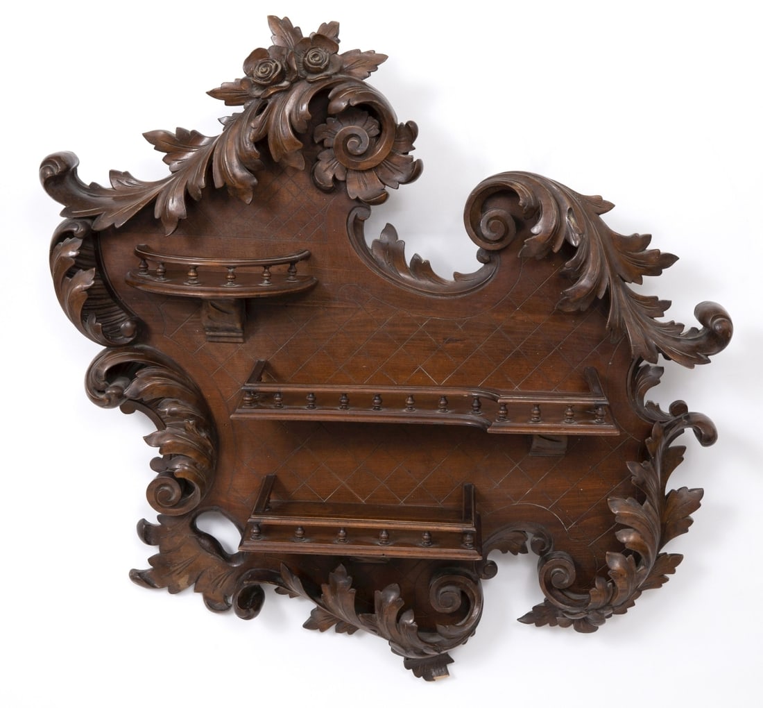 An antique wooden ornamental shelf in Rococo style: A luxurious wall shelf for miniatures or decorative objects, asymmetrically carved with period motifs Dimensions: 80-70-13 cm Slight missing at the bottom