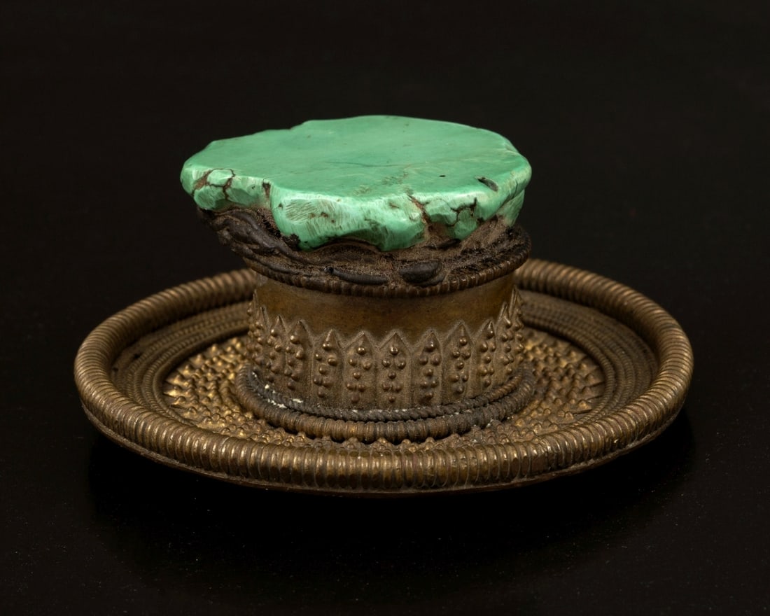 A head ornament for men adorned with a large turquoise stone, Tibetan , from the 19th century. (1 of 3)