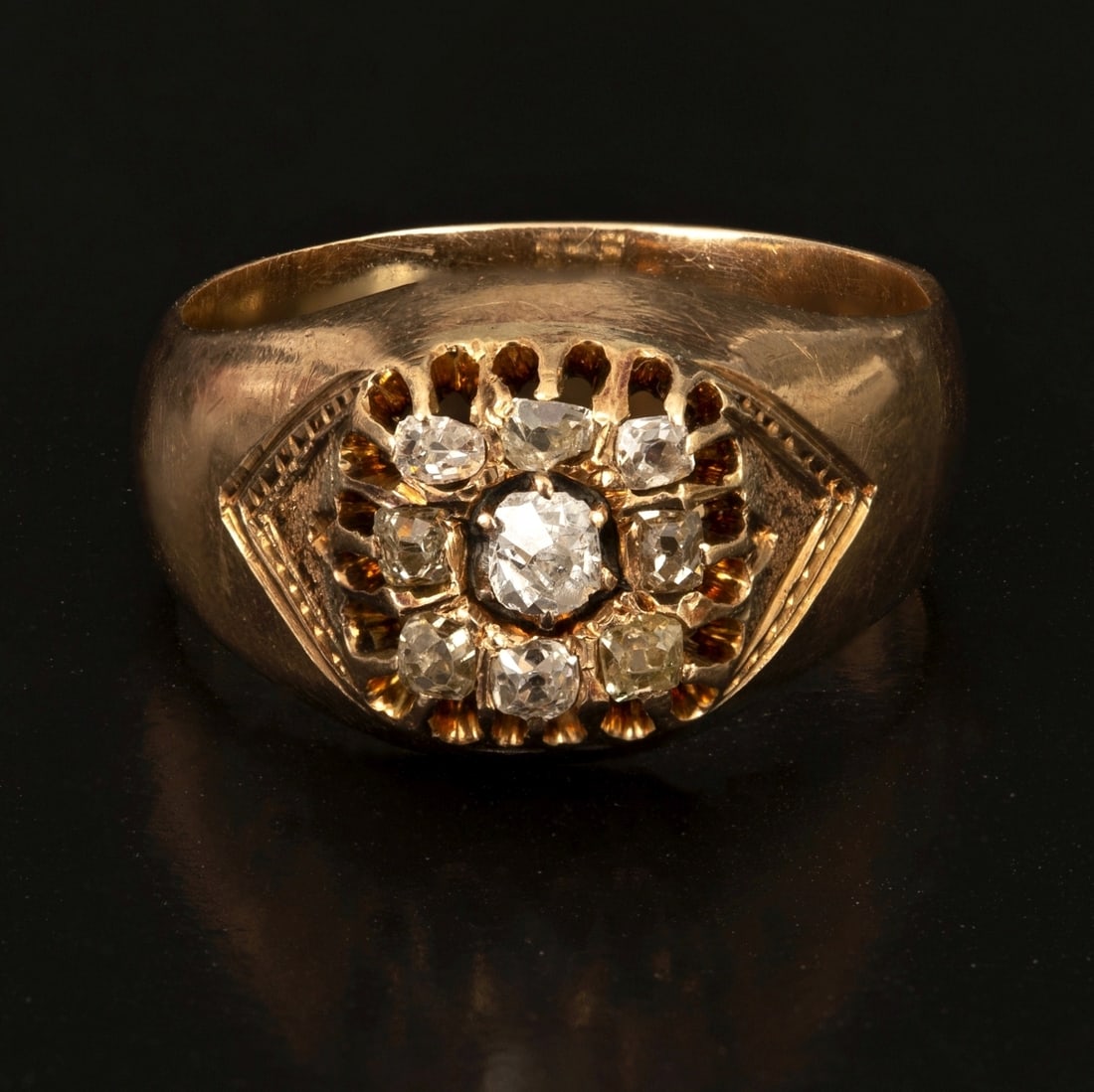 An antique Russian 14K gold ring set with diamonds: 14K Russian antique gold ring set with diamonds. Description: A massive and antique ring from the second half of the 19th century (likely Russian but no hallmark found), made of 14K rose gold (acid