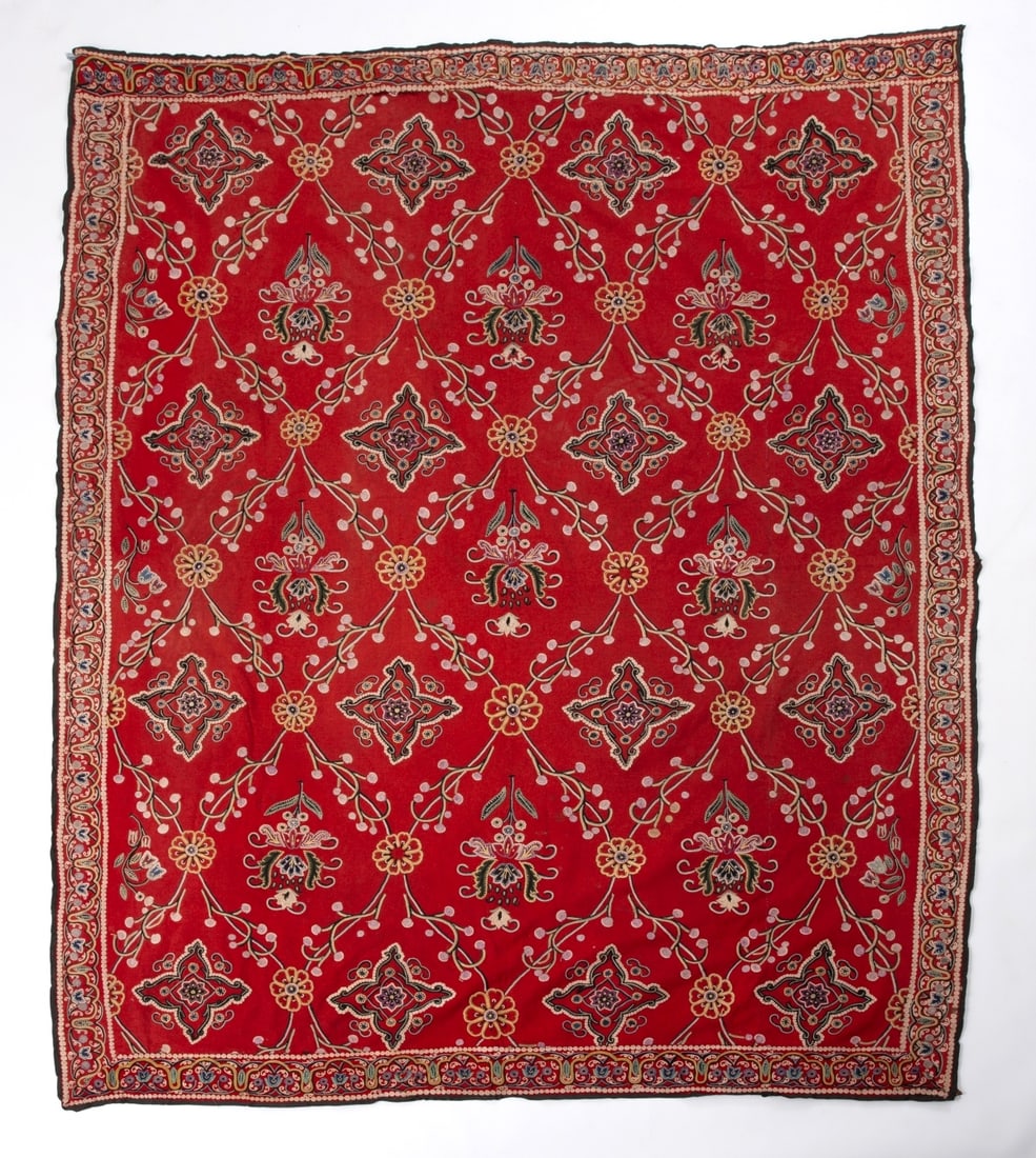 Persian textile (rasht) embroidered on a red background (1 of 2)