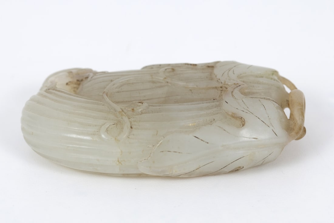 Chinese jade figurine carved with a scene of a beetle climbing two gourds, Ming Dynasty (1 of 4)