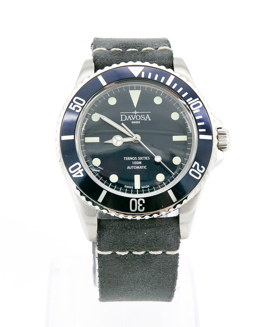 A Davosa Ternos Sixsties Sapphire Stainless Steel Wristwatch: A Davosa Ternos Sixsties Sapphire Stainless Steel Wristwatch Mechanism: Automatic Case: Stainless steel with etched Arabic numerals on a blue ground Dial: Dark blue with batons and circles Band: Black