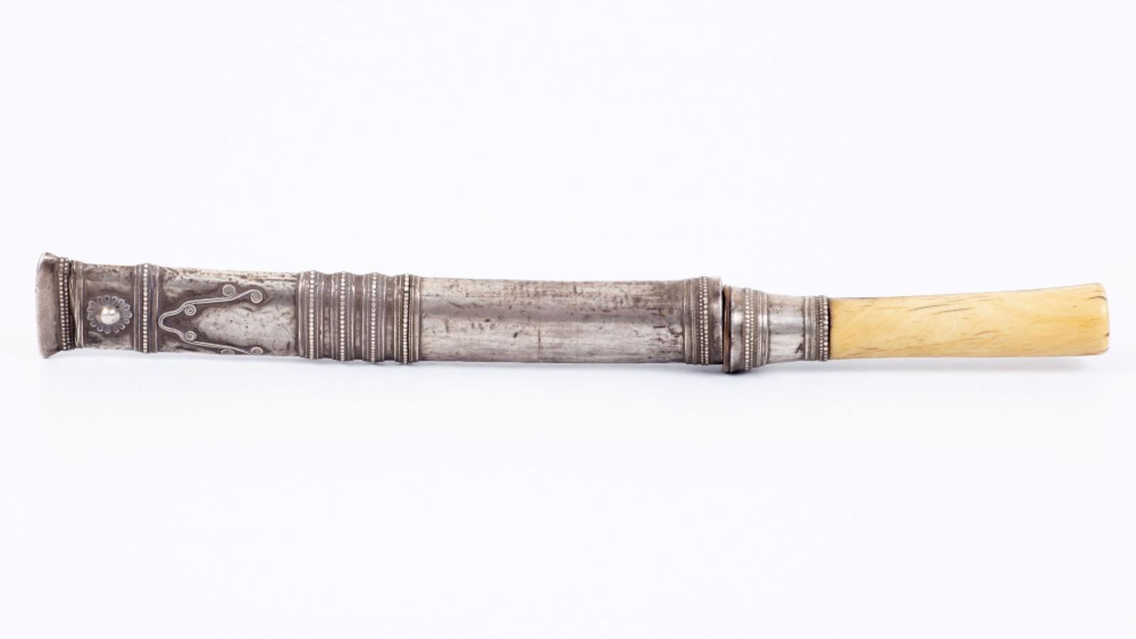 A Burmese Silver and Bone Dagger, Late 19th Century: A Burmese Silver and Bone Dagger, Late 19th Century The scabbard decorated with filigree work and the blade is made of steel Length: 30 cm; total weight: 181 gr <