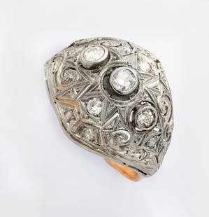 A Fine Edwardian 14K Rose Gold Platinum and Diamond Ring: A Fine Edwardian 14K Rose Gold Platinum and Diamond Ring The shank in 14K rose gold and the upper section in platinum, engraved and hammered with openwork and centered with old-cut diamonds (approx. 0