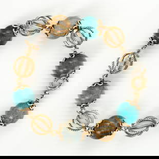 A Fine 14K Yellow Gold and Agate Bead Bracelet: A Fine 14K Yellow Gold and Agate Bead Bracelet Composed of spherical agate beads in turquoise and green tones, alternating with openwork gold beads (acid tested). Total weight: 42 gr; length: 22 c