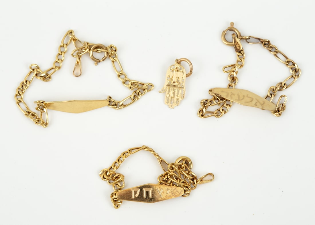 A Group of Three 14K Yellow Gold Bracelets and a Hamsa Pendant: A Group of Three 14K Yellow Gold Bracelets and a Hamsa Pendant Including: 1. Three 14K yellow gold chain bracelets for children, each with an engraved plaque. All signed and acid tested. 2. A 14K y