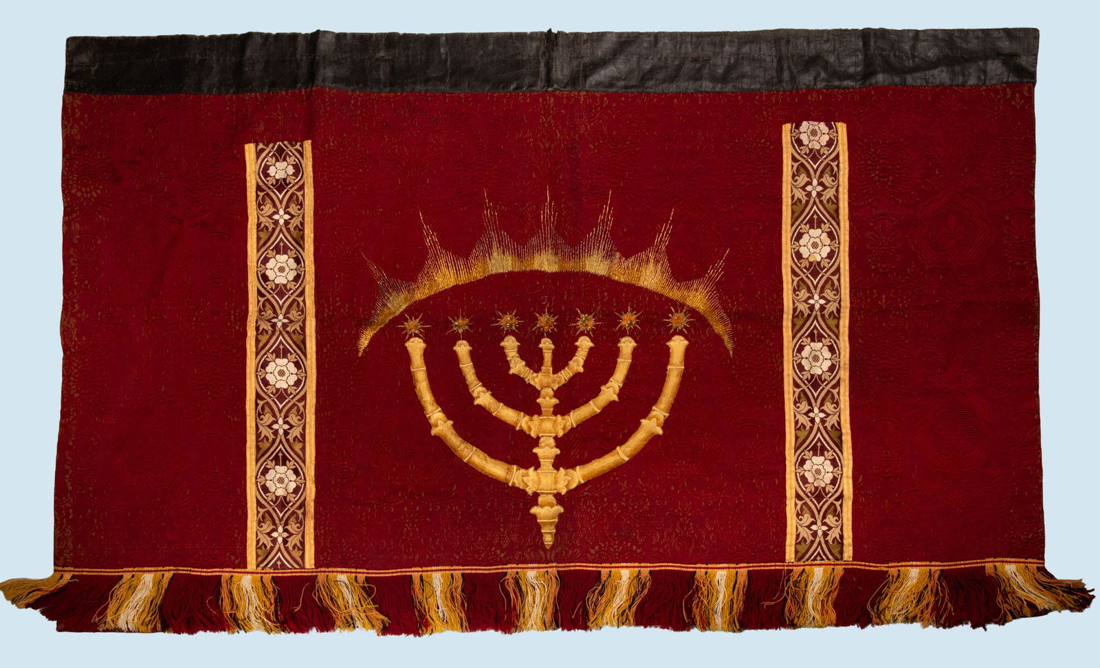 An Antique Synagogue Embroidered Textile, Italy, 19th Century: An Antique Synagogue Embroidered Textile, Italy, 19th Century A richly decorated textile likely used as a decorative frieze beneath a synagogue gallery or above the Torah ark. The fabric is woven in
