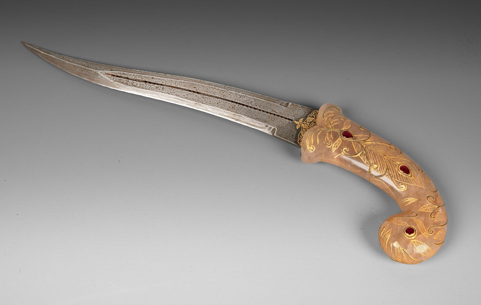 A Mughal-Style Parcel Gilt Stone and Gemstone Dagger (1 of 2)