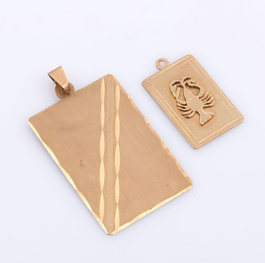 A Pair of 14K Yellow Gold Pendants (1 of 2)