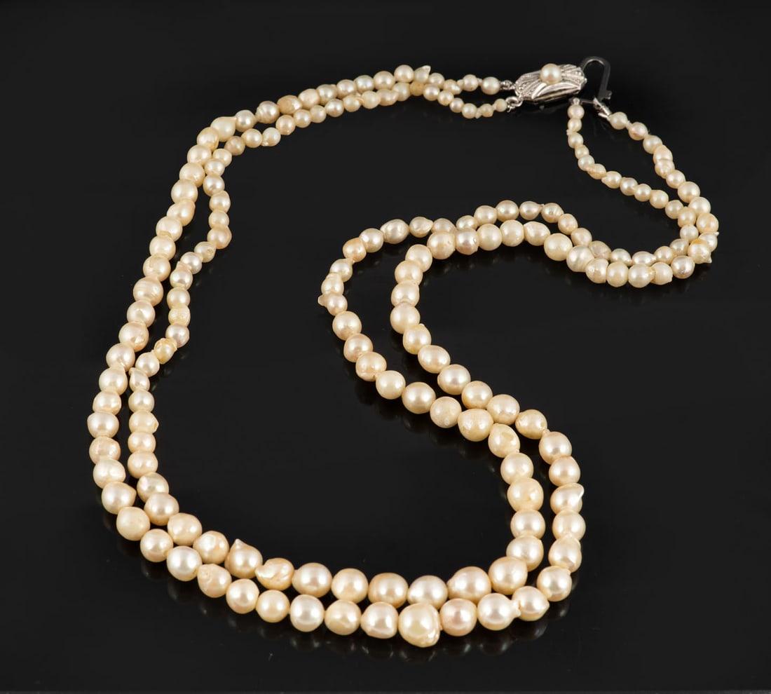 An Antique Art Deco Pearl Double Strand Necklace: An Antique Art Deco Pearl Double Strand Necklace
